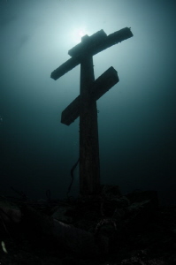 The cross is set on the underwater pinnacle in Lake Baykal. by Dmitry Starostenkov 